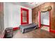 A bedroom with a small bed, featuring a bright window and wooden accents at 814 Welch Sw St, Atlanta, GA 30310