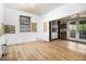 Bright, spacious room with hardwood floors, featuring natural light from large windows at 814 Welch Sw St, Atlanta, GA 30310