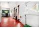A long room with hardwood floors, showcasing windows and charming design elements at 814 Welch Sw St, Atlanta, GA 30310