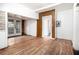 Bright, spacious room with hardwood floors, featuring natural light from large windows at 814 Welch Sw St, Atlanta, GA 30310