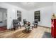 Inviting living room with bright light from window and beautiful red fireplace at 814 Welch Sw St, Atlanta, GA 30310