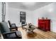 Inviting living room with bright light from window and beautiful red fireplace at 814 Welch Sw St, Atlanta, GA 30310