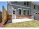 Backyard featuring fenced yard with grass and concrete patio at 1600 Ruskin Way, Marietta, GA 30062