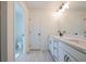 Bathroom featuring double sink vanity with white cabinets and black hardware at 1600 Ruskin Way, Marietta, GA 30062