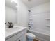 Bathroom featuring single sink vanity and tub with shower at 1600 Ruskin Way, Marietta, GA 30062