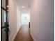 Inviting hallway with hardwood floors and neutral paint at 1600 Ruskin Way, Marietta, GA 30062