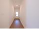 Bright hallway leading to a white door at 1600 Ruskin Way, Marietta, GA 30062