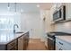 Modern kitchen featuring stainless steel appliances and sleek countertops at 1600 Ruskin Way, Marietta, GA 30062