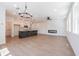 Bright and airy living room with wood floors, modern fireplace, and open floor plan at 1600 Ruskin Way, Marietta, GA 30062