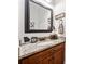 Bathroom with granite countertop and wood cabinets at 2442 Lower Union Hill Rd, Canton, GA 30115