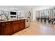 Spacious kitchen featuring granite countertops and stainless appliances, connected to dining area at 2442 Lower Union Hill Rd, Canton, GA 30115