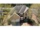 An attractive brick home with a well-maintained lawn and mature trees at 2688 Autumn Ridge Ln, Lawrenceville, GA 30044