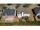 An aerial view of the home and its backyard including a deck and green space at 2688 Autumn Ridge Ln, Lawrenceville, GA 30044
