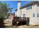 Backyard view of exterior elevation and elevated wooden deck at 2688 Autumn Ridge Ln, Lawrenceville, GA 30044