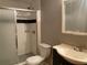 Cozy bathroom with enclosed shower, checkered tile and single sink vanity at 2688 Autumn Ridge Ln, Lawrenceville, GA 30044