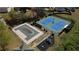 Community amenities include a covered pool, playground, and tennis courts surrounded by landscaping at 2688 Autumn Ridge Ln, Lawrenceville, GA 30044