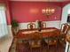 Dining room with chandelier, decorative rug, and wainscoting at 2688 Autumn Ridge Ln, Lawrenceville, GA 30044