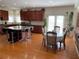 Open kitchen area with eat-in dining, hardwood floors and lots of natural light at 2688 Autumn Ridge Ln, Lawrenceville, GA 30044