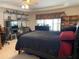 Main bedroom featuring carpeted floors, neutral walls, and multiple storage shelves at 2688 Autumn Ridge Ln, Lawrenceville, GA 30044