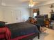 This is a bedroom with neutral walls, carpeted floors, and a ceiling fan at 2688 Autumn Ridge Ln, Lawrenceville, GA 30044