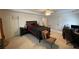 Large main bedroom with a ceiling fan, carpeted floor, and multiple closets at 2688 Autumn Ridge Ln, Lawrenceville, GA 30044