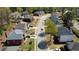 Quiet street view showcasing the well-kept lawns, mature trees, and varied architecture of the neighborhood homes at 2688 Autumn Ridge Ln, Lawrenceville, GA 30044