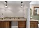 Bathroom with long vanity, pendant lighting, and a second sink space at 3441 Palace Ct, Tucker, GA 30084