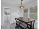 Kitchen features an eat-in breakfast nook with a view of the laundry room at 3441 Palace Ct, Tucker, GA 30084