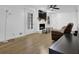 Spacious living room with hardwood floors, a fireplace, and bright, natural light at 3441 Palace Ct, Tucker, GA 30084