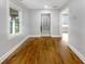 Bright living room featuring gleaming hardwood floors and fresh paint at 1886 Hazelwood Se Dr, Marietta, GA 30067