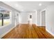 Open living room with refinished hardwood floors and plenty of natural light at 1886 Hazelwood Se Dr, Marietta, GA 30067