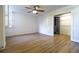 Spacious bedroom boasts natural light, wood-style flooring, and a walk-in closet with double doors for ample storage at 2965 Pharr Court South Nw # 503, Atlanta, GA 30305