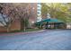 Multi-level brick apartment building with covered front entrance and mature trees at 2965 Pharr Court South Nw # 503, Atlanta, GA 30305