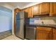 Kitchen with stainless steel appliances and wooden cabinets at 2965 Pharr Court South Nw # 503, Atlanta, GA 30305