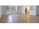 Sunlit living room with built-in bookshelves and hardwood floors at 2965 Pharr Court South Nw # 503, Atlanta, GA 30305