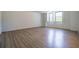 Living room with built-in bookshelves and large windows at 2965 Pharr Court South Nw # 503, Atlanta, GA 30305