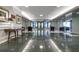 Well lit entry lobby with ceramic tile flooring, seating, and decor at 2965 Pharr Court South Nw # 503, Atlanta, GA 30305