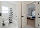 Bathroom with a shower-tub combo and black and white striped shower curtain at 3515 Montebello Pkwy, Cumming, GA 30028