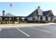 Stylish clubhouse with a covered pavilion, landscaped grounds, and ample parking for community gatherings at 3515 Montebello Pkwy, Cumming, GA 30028