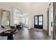 Inviting entryway with hardwood floors, dining room, and barn door at 3515 Montebello Pkwy, Cumming, GA 30028