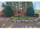The Enclave at Waterford entrance sign surrounded by flowers, a beautiful community at 4870 Odum View Ln, Cumming, GA 30040
