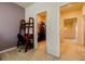Bright hallway with access to a well-organized walk-in closet and multiple rooms at 4870 Odum View Ln, Cumming, GA 30040