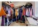 Spacious walk-in closet with ample shelving, hanging space, and a built-in desk area at 4870 Odum View Ln, Cumming, GA 30040