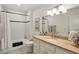 Bathroom with white subway tile in the shower and a marble vanity at 710 E Northway Ln, Atlanta, GA 30342