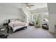 Bright bedroom with vaulted ceilings, custom millwork, and shuttered windows at 710 E Northway Ln, Atlanta, GA 30342