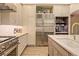 Well-appointed kitchen with a large refrigerator, stainless steel appliances, and ample storage space at 710 E Northway Ln, Atlanta, GA 30342