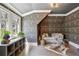 Cozy sitting room featuring hardwood floors, patterned wallpaper, and natural light at 710 E Northway Ln, Atlanta, GA 30342
