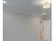 Bright bedroom featuring neutral paint, contemporary lighting, and white trim details at 1628 Ruskin Way, Marietta, GA 30062