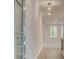 Inviting entryway featuring sidelight window and modern lighting fixture at 1628 Ruskin Way, Marietta, GA 30062