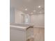 Open hallway area with neutral walls and light wood-look flooring at 1628 Ruskin Way, Marietta, GA 30062
